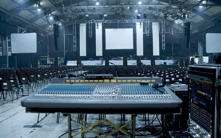Audio mixing desk in a live event venue